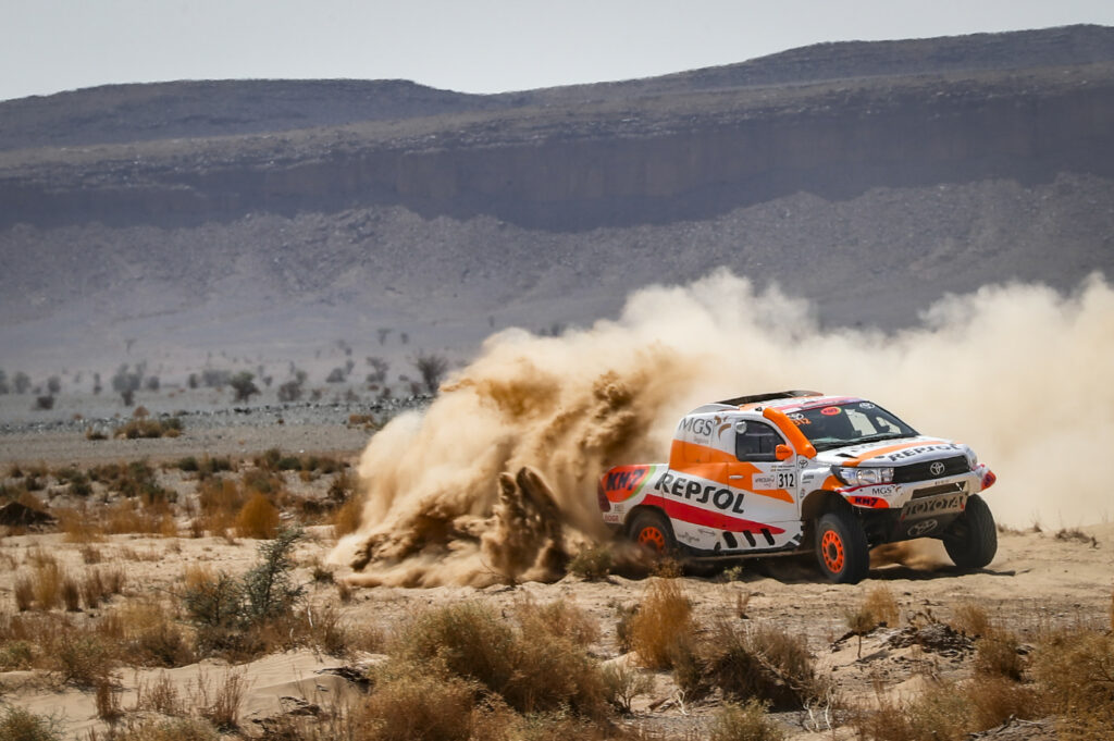 Exciting Rally Car Race Wallpaper: Desert Drift & Dusty Action