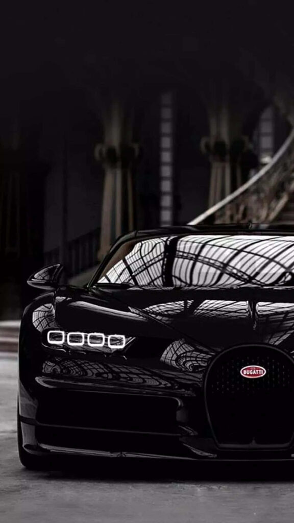Exotic Black Bugatti: Luxury Wallpaper in Opulent Setting