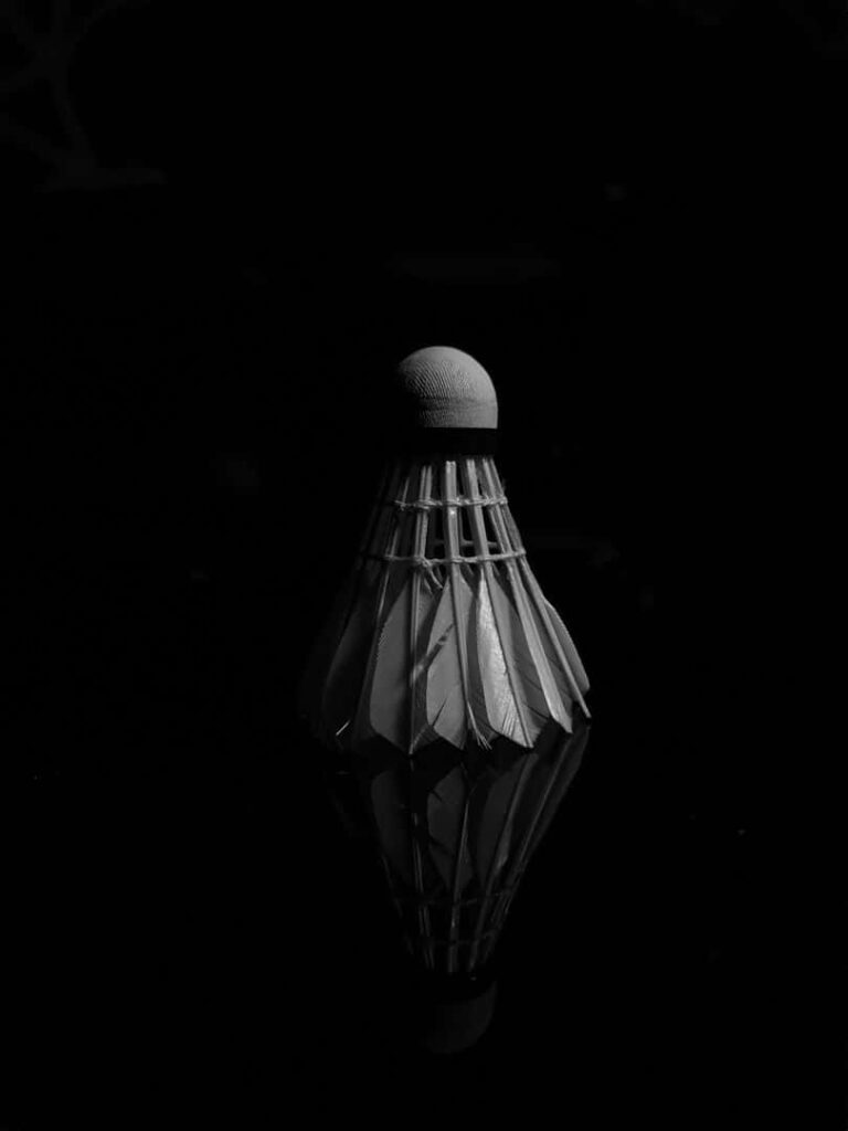 Badminton Shuttlecock in Dark Black Monochrome Background Wallpaper
