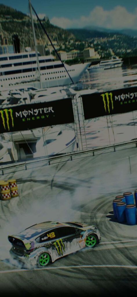 Dirt 3 Rally Car Power Sliding on Dirt Track with Black & Green Livery, Monster Energy Logo - Urban & Coastal Background Wallpaper