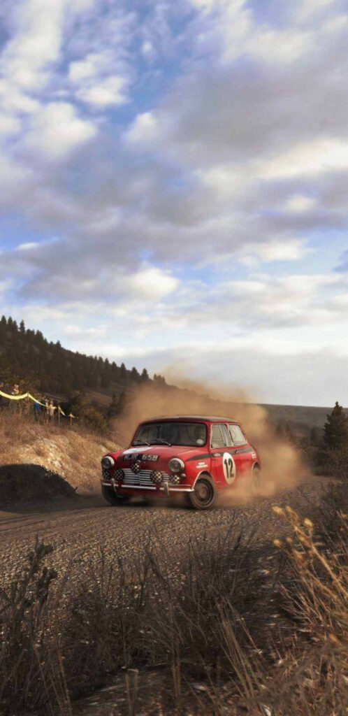 Classic Red Rally Car Speeding Down Dusty Gravel Road - Rally Wallpaper Scenery