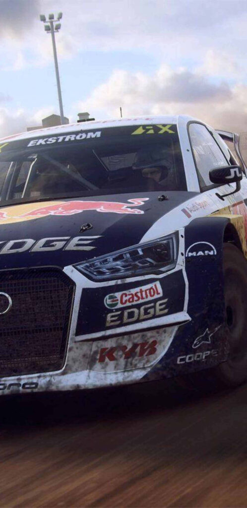 Close-up of mud-splattered rally car racing on dirt track in intense scene - perfect for dirt rally game wallpaper