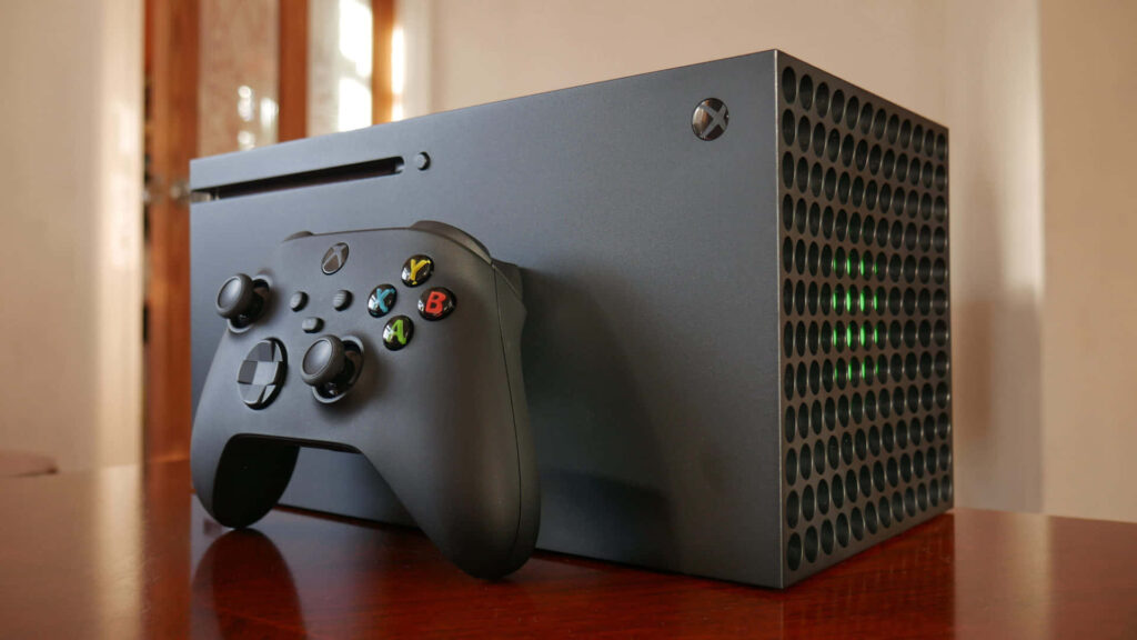 Xbox with Controller on Table Background Wallpaper