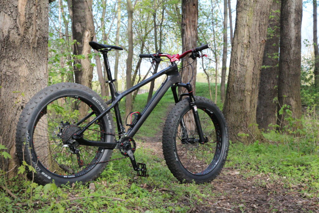 Fatbike Fever: Conquering Terrains on Bulky Wheels Wallpaper