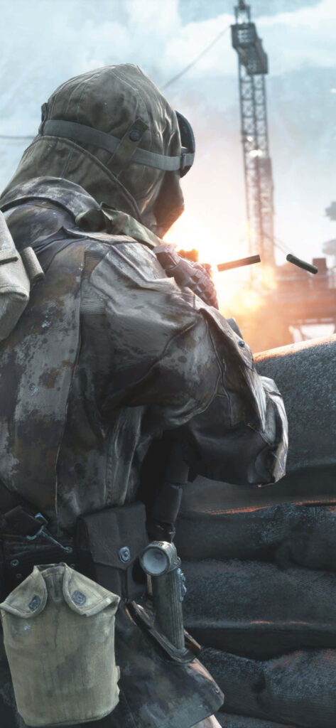 Battlefield V Soldier in WWII Setting with Rifle, Military Gear - Intense Game Atmosphere Wallpaper