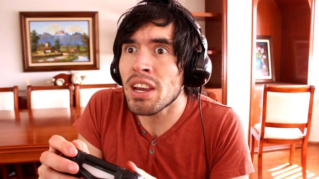 Expressive HolaSoyGerman gaming wallpaper shocked face black headphones maroon shirt desktop background
