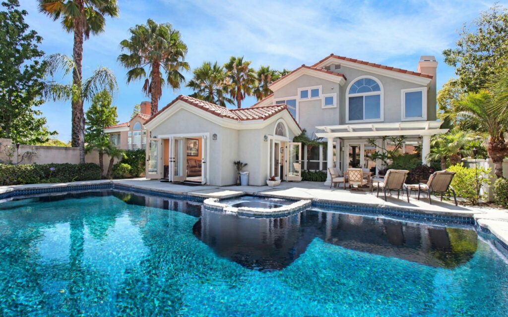 Opulent Residence: a Majestic Abode with Wealth and Style Wallpaper