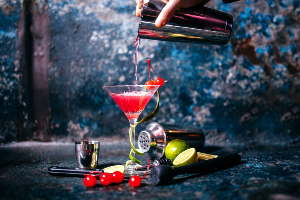 Exquisite Delight: Captivating a Festive Glass Filled with Cocktails and Luscious Cherries in an HD Still Life Wallpaper