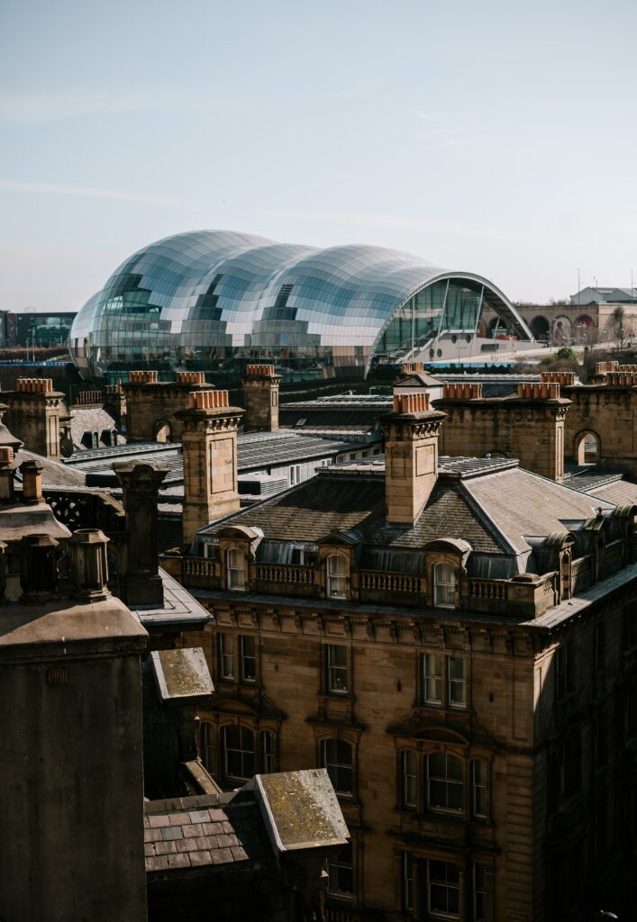 Aerial Cityscape Wallpaper: Blend of Historic and Modern Architecture