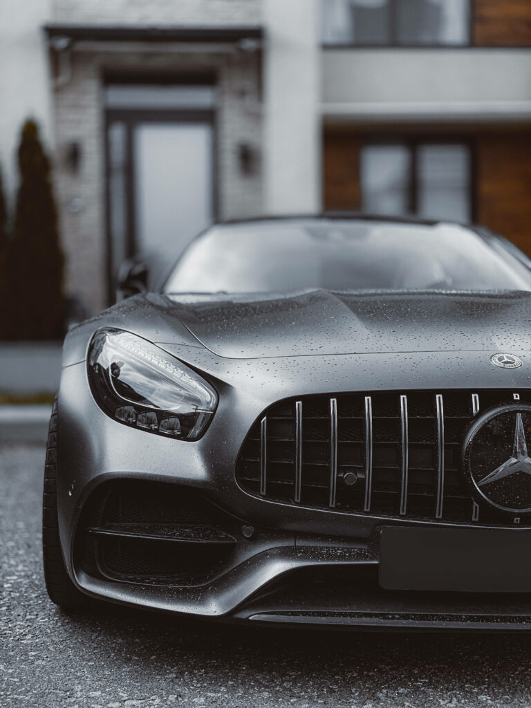 Zooming in on the Sleek Mercedes AMG Grills: iPhone Background Visual Wallpaper