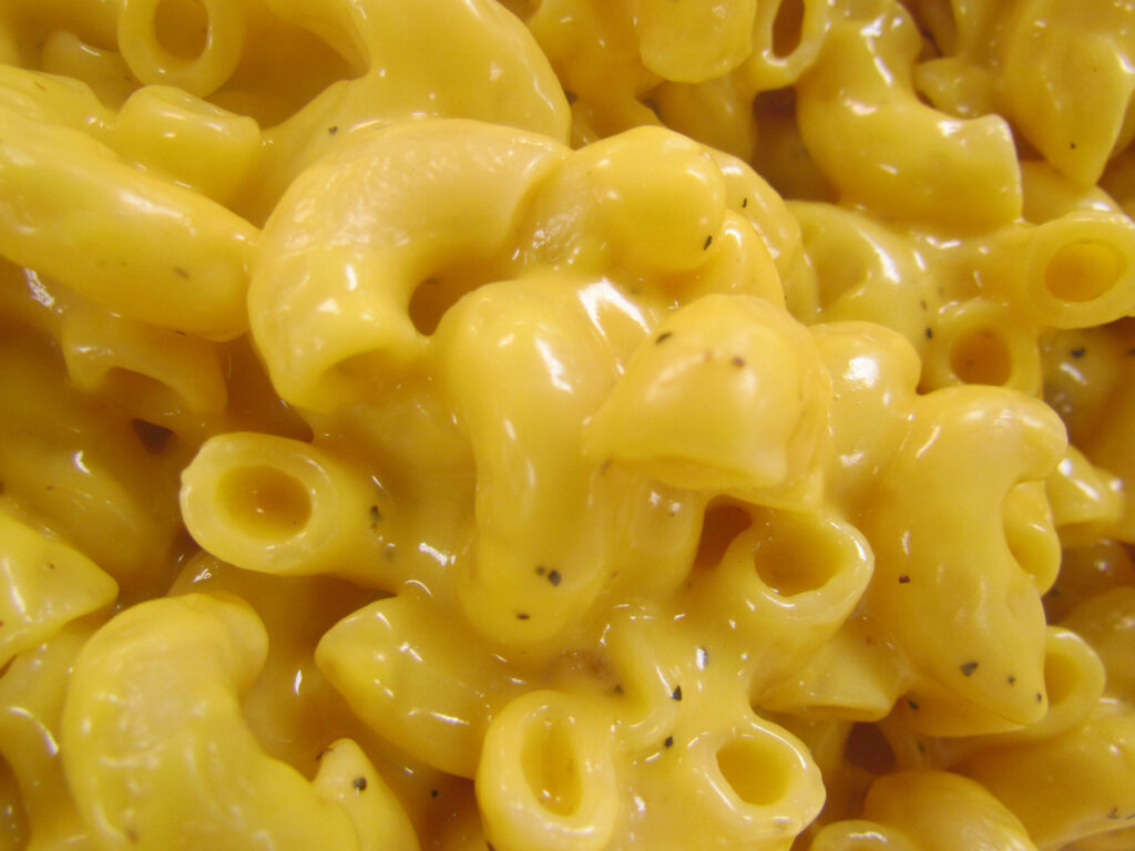 Close-Up Extra Cheesy Mac and Cheese Wallpaper: Creamy Delight