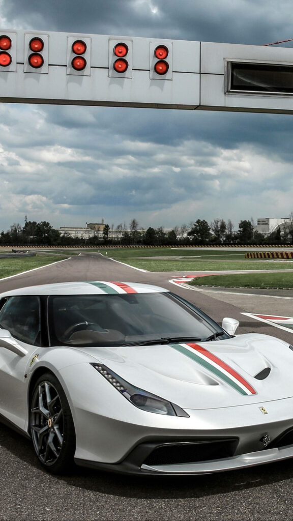 Exhilarating Action Shot of Ferrari Speciale: White Beauty Powering Through the Racetrack Wallpaper