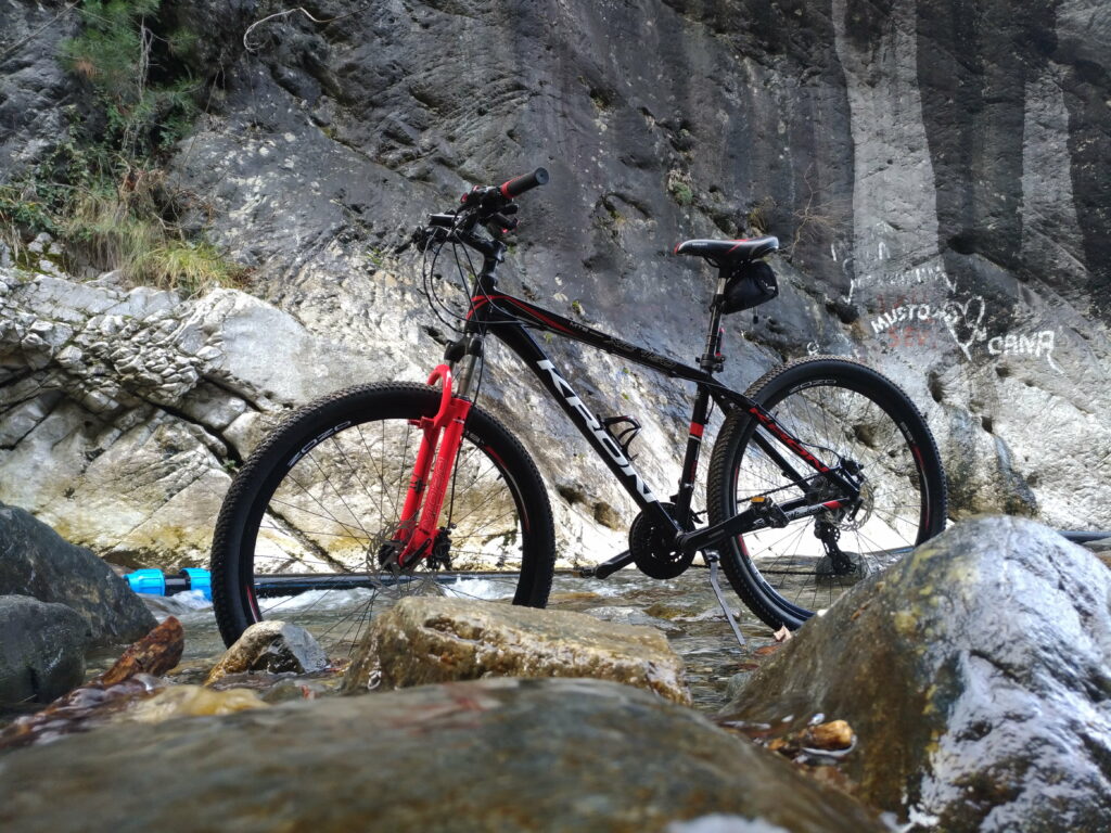 Thrilling MTB Adventure: Exploring Breathtaking Landscapes with the Kron XC Bike Wallpaper