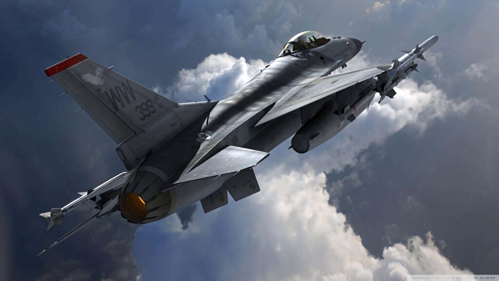 F-16 Fighting Falcon jet soaring above clouds with glowing afterburner and metallic details wallpaper