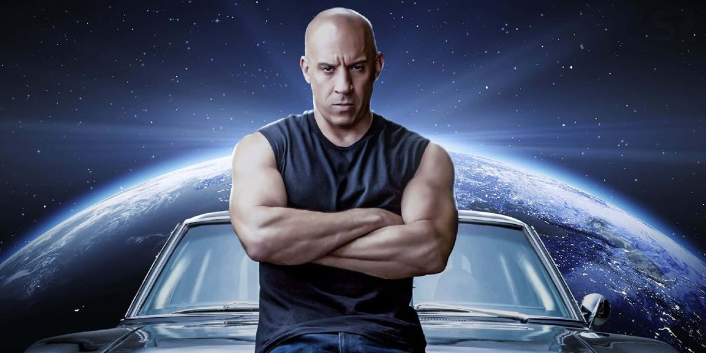 Vin Diesel as Dominic Toretto with classic muscle car in space F9 Fast Furious wallpaper
