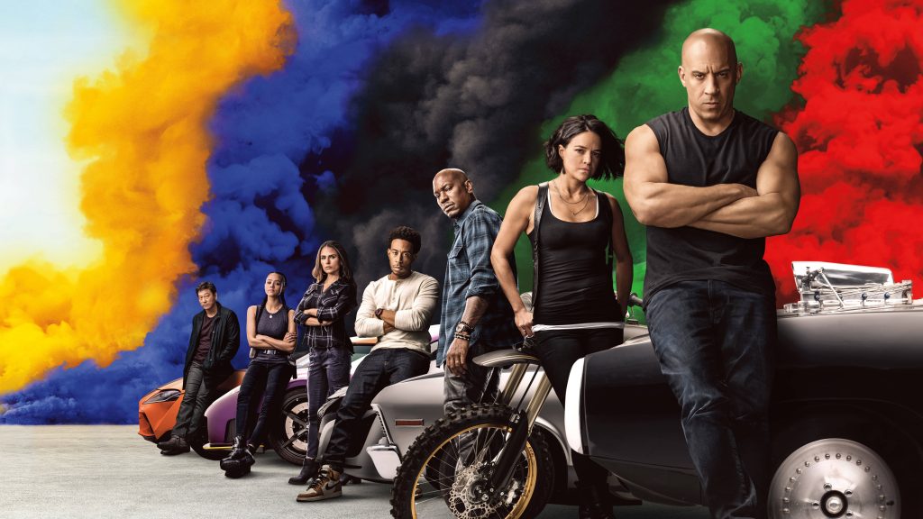 F9 Fast Saga wallpaper Vin Diesel Michelle Rodriguez with cars vibrant colorful smoke background