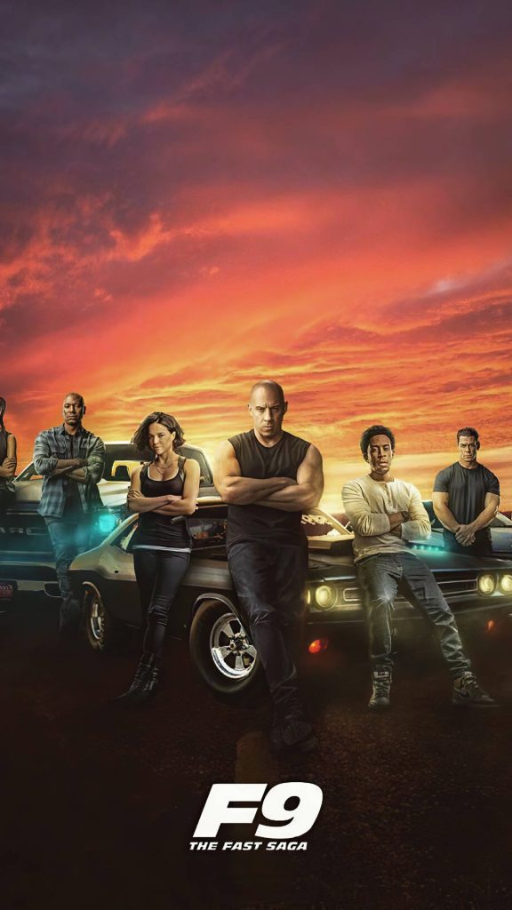 F9 Fast Saga cast Vin Diesel and team with muscle cars at fiery sunset action wallpaper