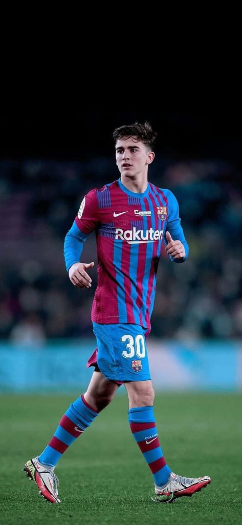 Gavi FC Barcelona action shot in blue garnet kit number 30 vibrant high resolution wallpaper