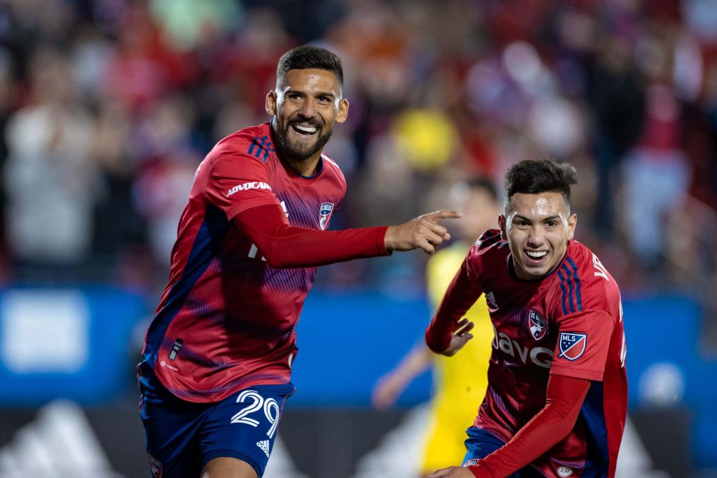 FC Dallas Franco Jara Alan Velasco goal celebration vibrant red jerseys night stadium wallpaper