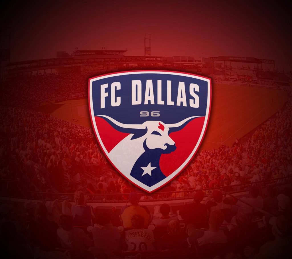 FC Dallas wallpaper with club crest bull star over red-tinted stadium soccer background