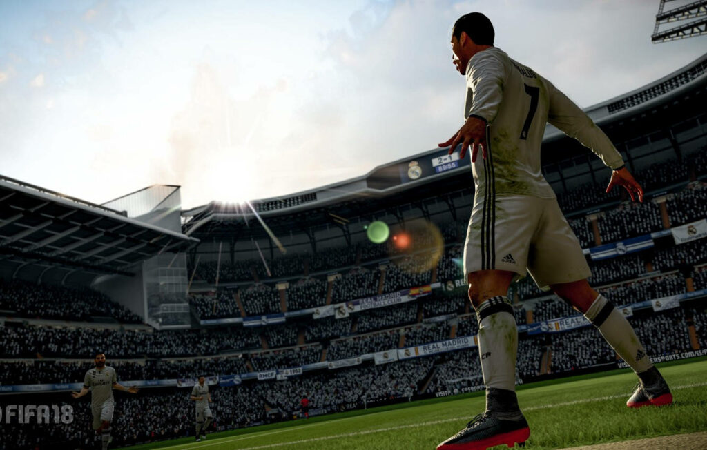 FIFA 18 Player on Field with Energetic Stadium Background Wallpaper