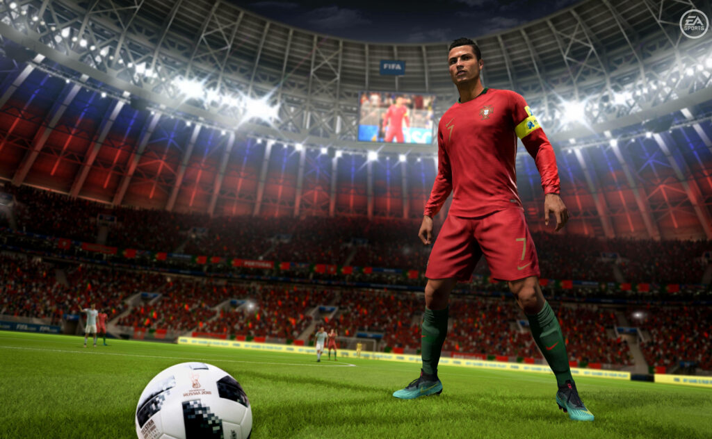 Game-Ready FIFA 21 Star Flaunts Vibrant Uniform in Electrifying Football Stadium Wallpaper