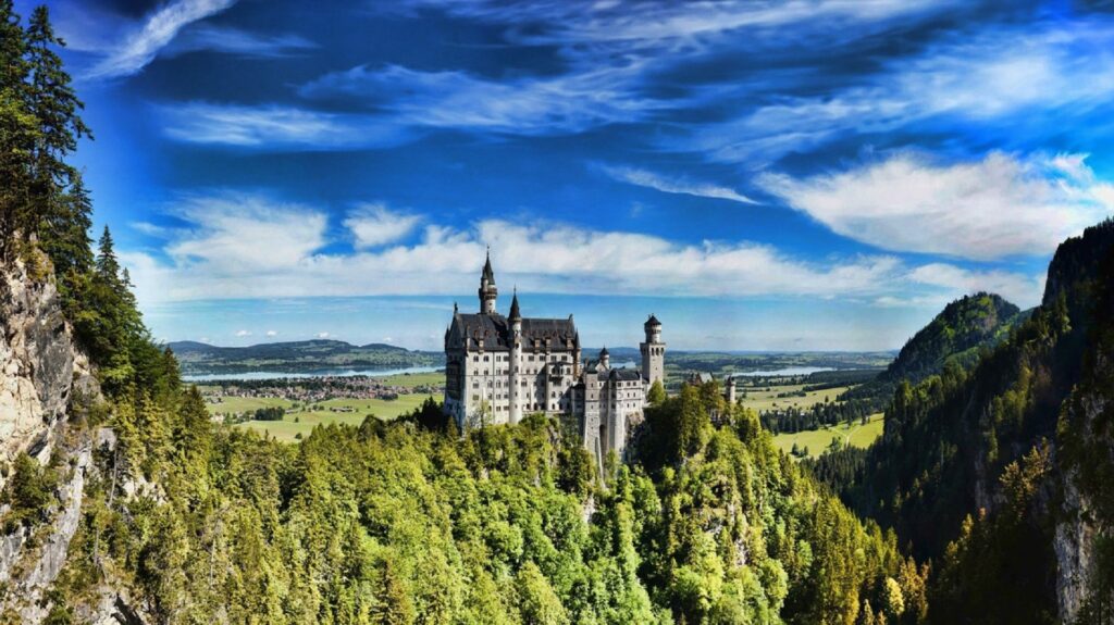 Enchanting Neuschwanstein Castle Wallpaper Background in Fussen, Germany