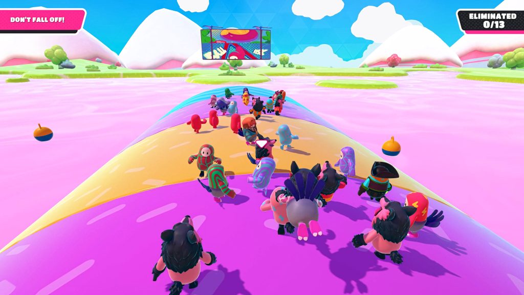 Fall Guys Ultimate Knockout vibrant colorful beans in costumes on rotating ring over pink slime sea Wallpaper