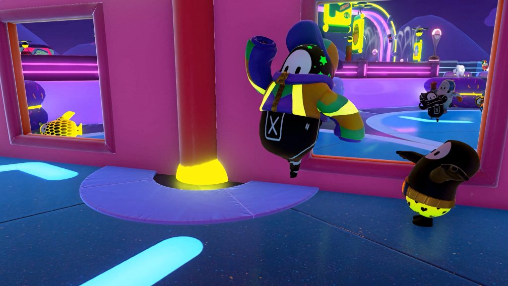Fall Guys character in chopper cap jumping on vibrant neon pink blue obstacle course wallpaper