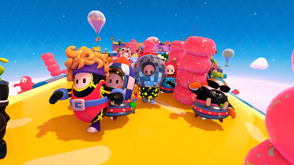 Fall Guys Season 4 wallpaper 3D characters in retro costumes racing on yellow track background