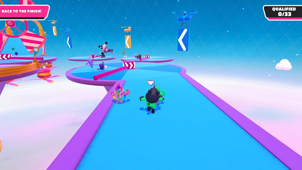 Fall Guys Ultimate Knockout colorful bean characters racing on blue platforms dodging pink sweepers Wallpaper