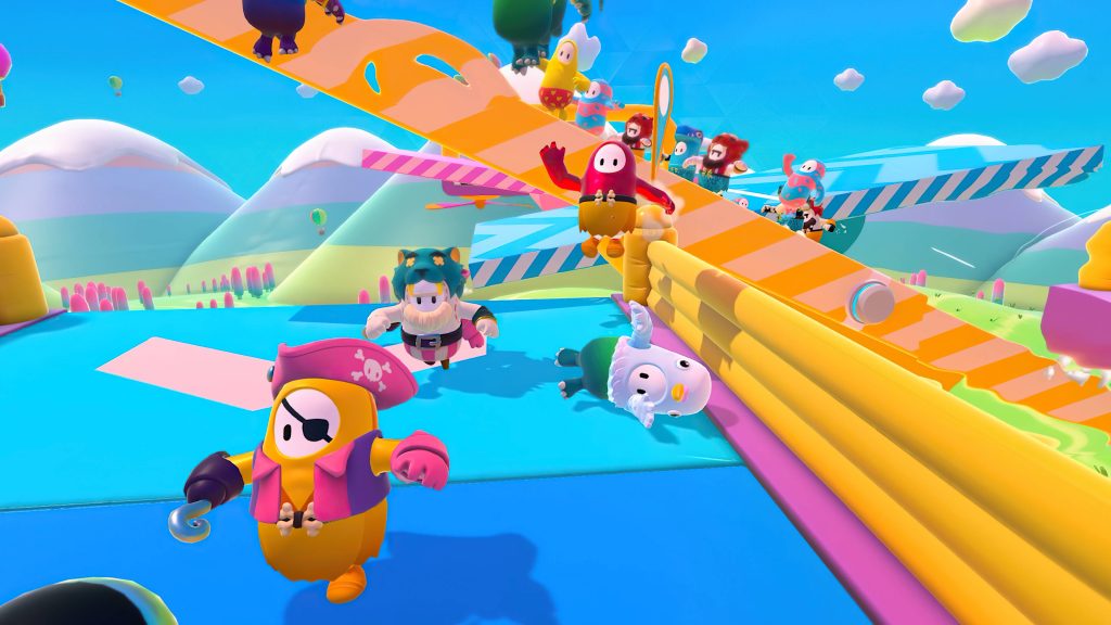Colorful Fall Guys characters in pirate and pigeon costumes race on Whirlygig course Wallpaper