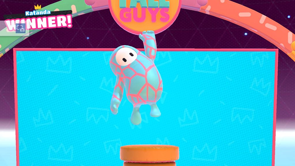Fall Guys Ultimate Knockout winner bean on orange podium with crown banner cyan background wallpaper