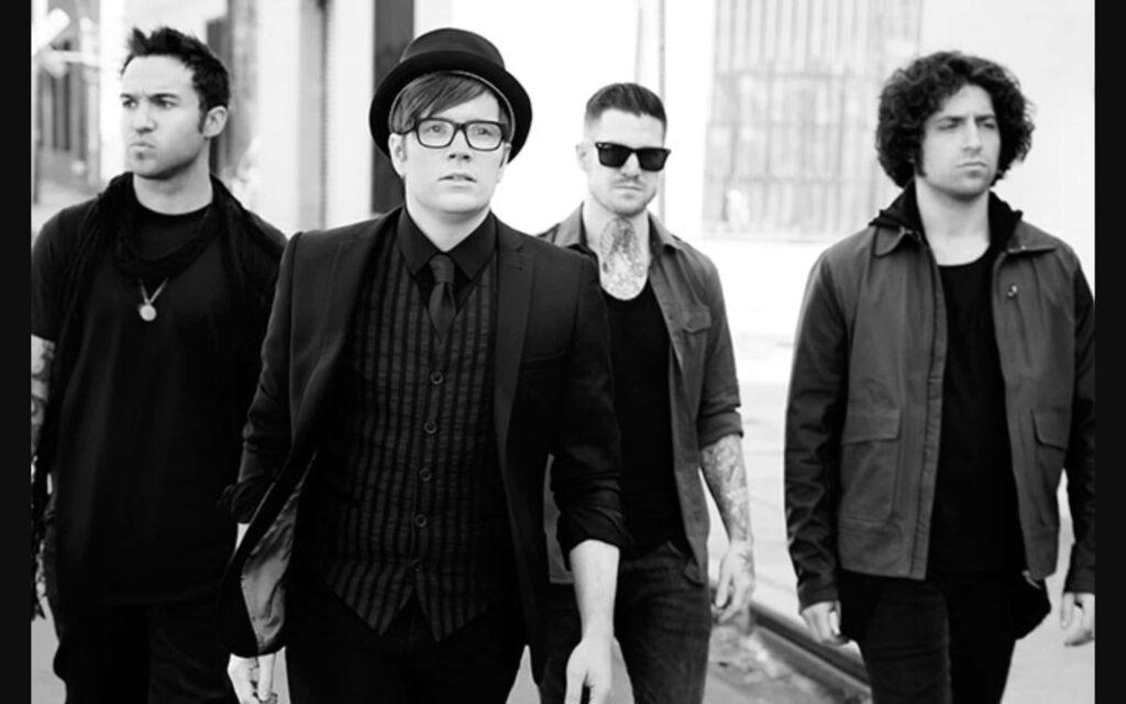 Fall Out Boy band members black and white wallpaper showing unity and signature style background