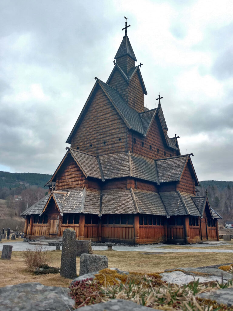 Autumn Heddal Stave Church Wallpaper: Serene Landscape & Architecture