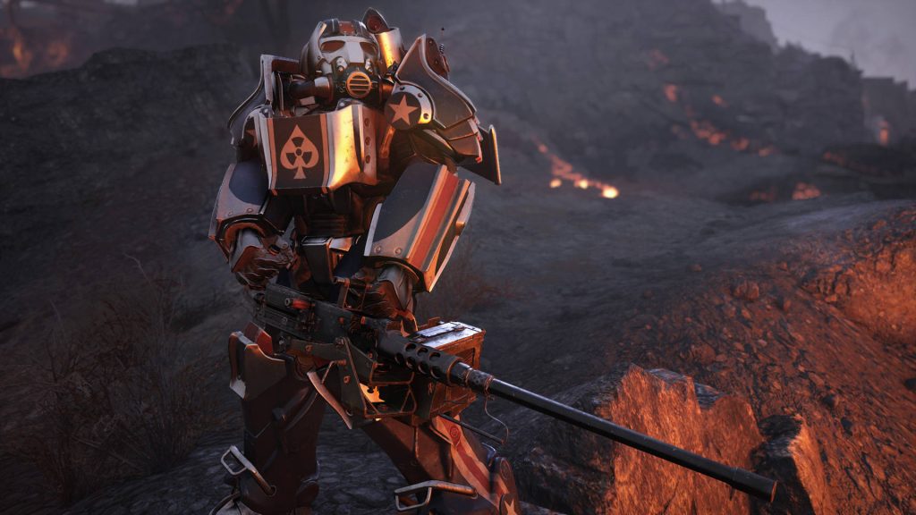 Fallout 76 wallpaper survivor in customized Power Armor with Ace of Spades wielding heavy gun