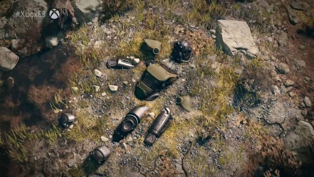 Fallout 76 CGI wallpaper top-down view of buried Power Armor pieces in rocky wasteland dirt