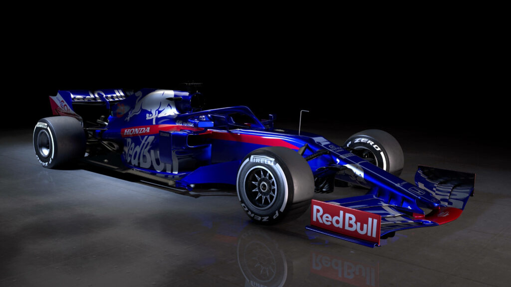 Exquisite Snapshot of Toro Rosso's Str14 Car at Formula 1 2019 Event, Embracing Red Bull's Vibrant Blue and Red Theme Wallpaper