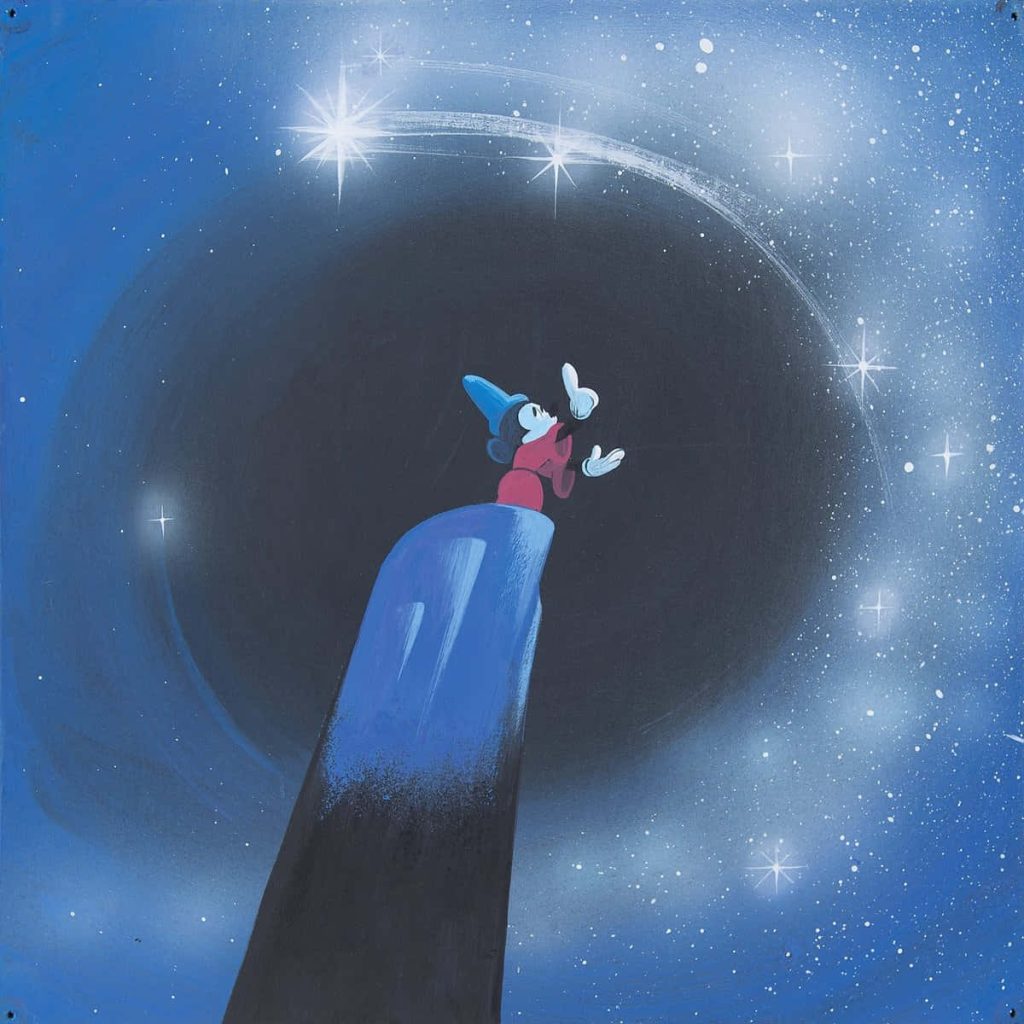 Sorcerer’s Apprentice Mickey Mouse casting glowing stars on dark mountain under cosmic sky wallpaper