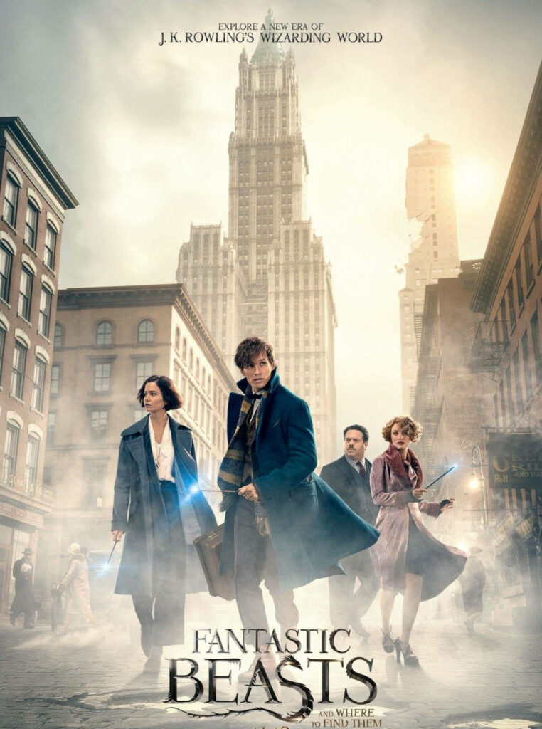 Fantastic Beasts main characters walking misty New York streets with wands iconic buildings Wallpaper