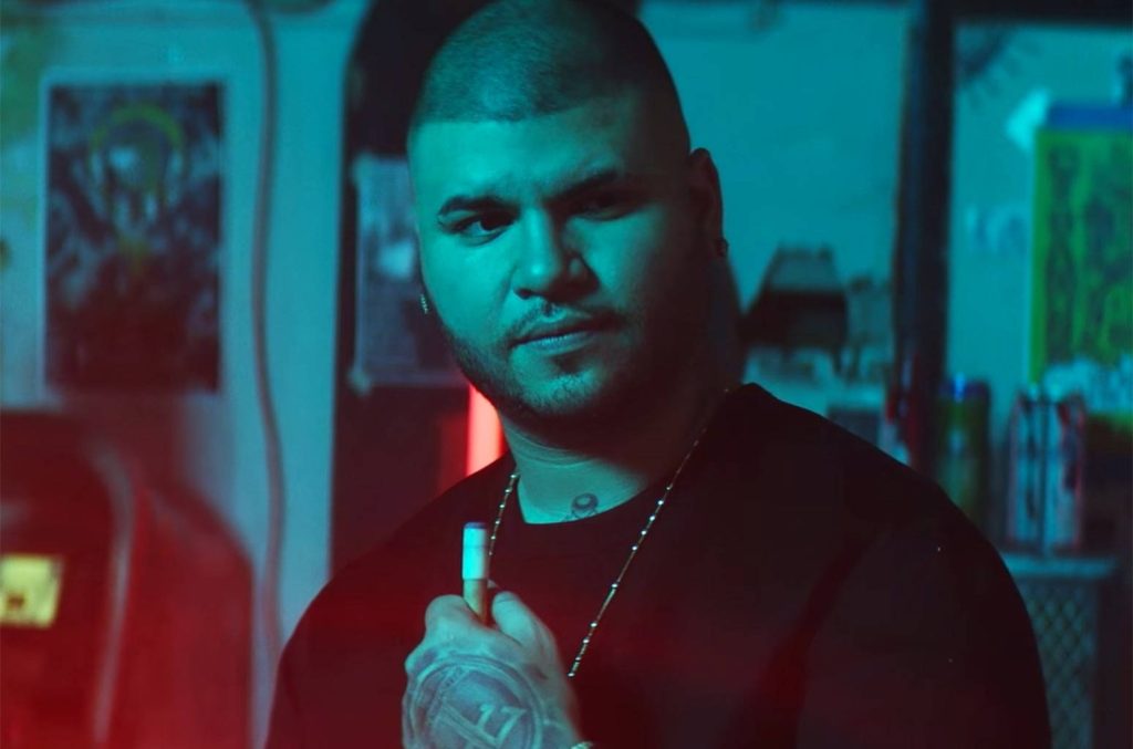 Farruko portrait with billiard cue in blue red lighting cinematic moody wallpaper background
