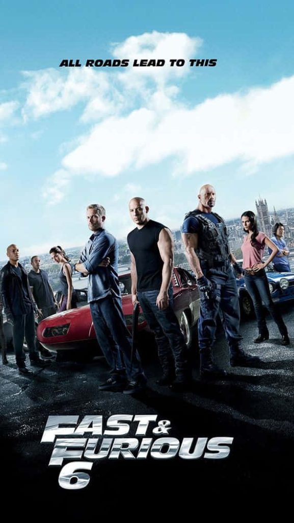 Fast and Furious 6 wallpaper with Vin Diesel Paul Walker Dwayne Johnson red muscle car cityscape