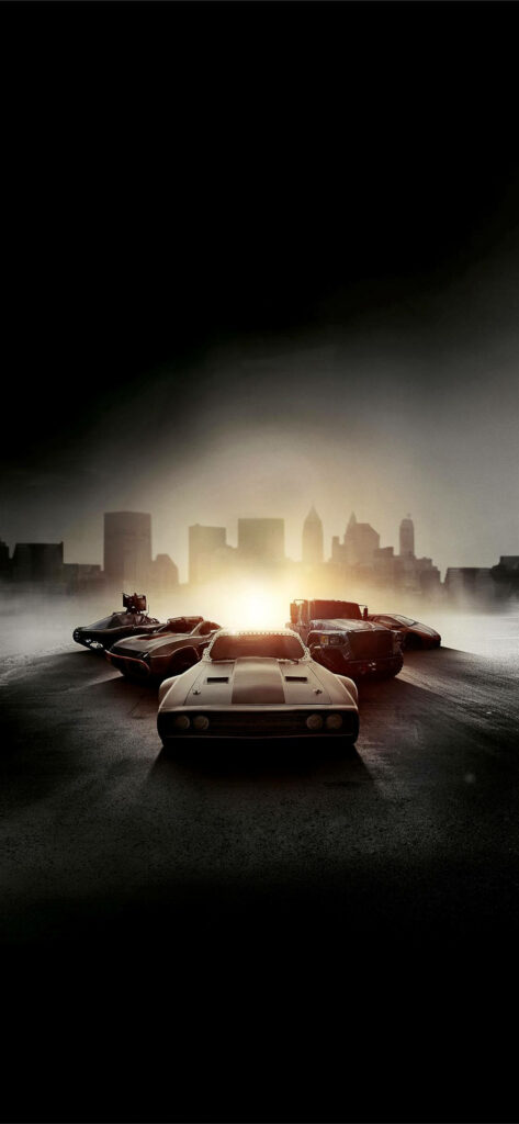 Powerful cars lined up on city street with skyline capturing Fast and Furious 8 high-speed excitement Wallpaper