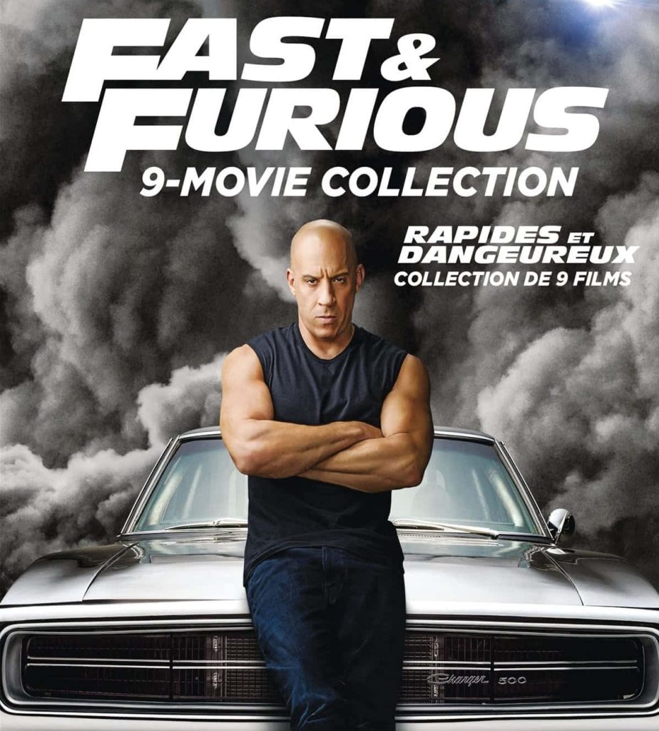 Vin Diesel as Dominic Toretto with Dodge Charger 500 in smoky Fast and Furious 9 wallpaper