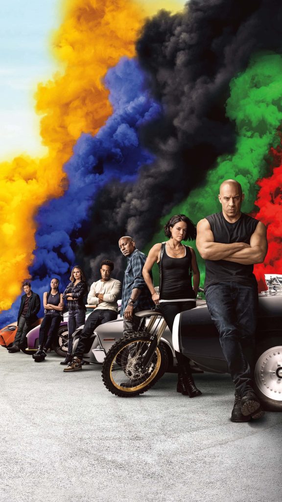 Fast and Furious 9 wallpaper with Vin Diesel Michelle Rodriguez and cars amid vibrant smoke clouds