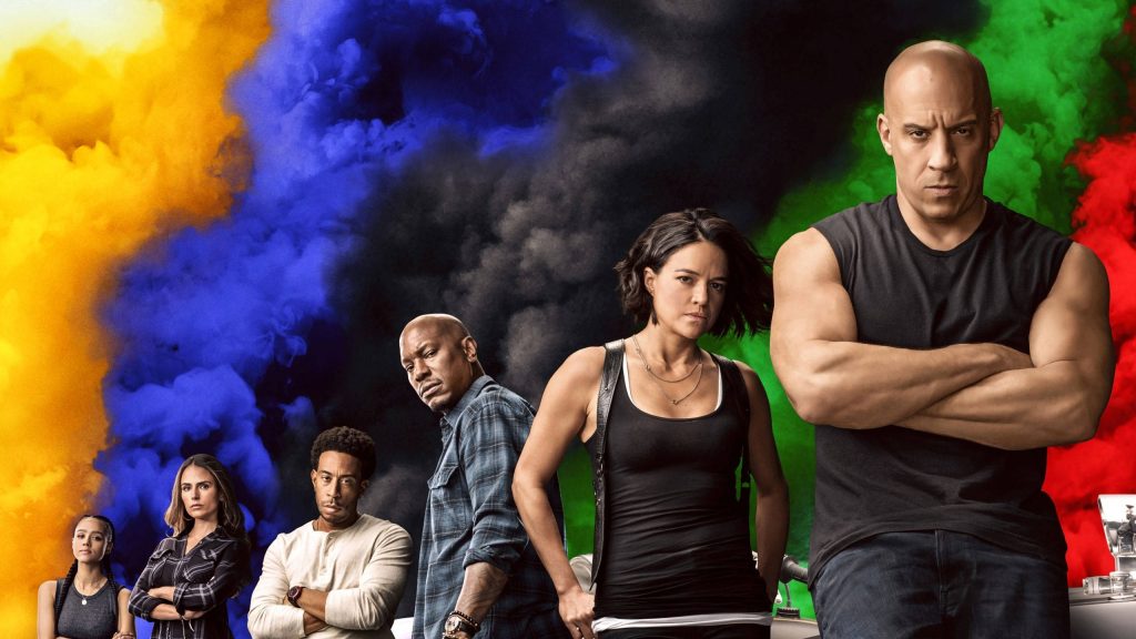 Fast and Furious wallpaper with Vin Diesel Michelle Rodriguez and smoky vibrant background action cast