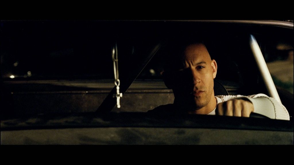 Vin Diesel as Dominic Toretto intense behind wheel Fast and Furious moody cinematic wallpaper