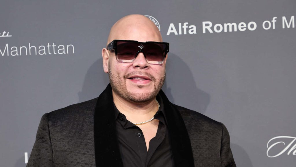 Fat Joe in black suit and sunglasses at Alfa Romeo Manhattan event stylish wallpaper background