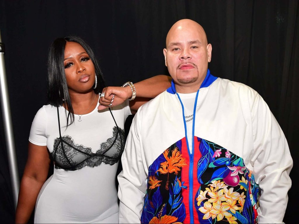 Fat Joe in floral bomber jacket and Remy Ma in white dress with black lace backstage portrait Wallpaper