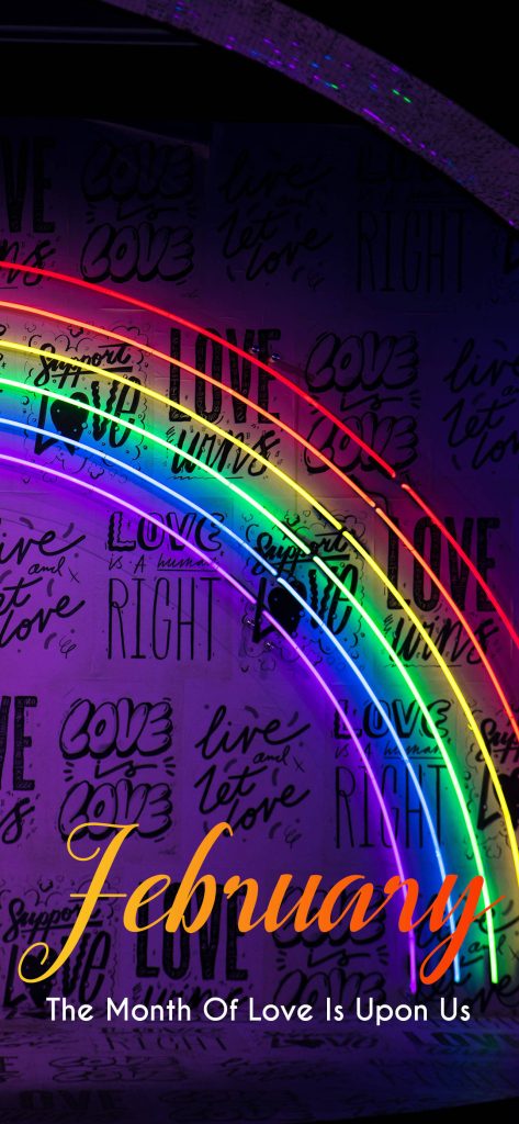 Vibrant neon rainbow arch and love messages graffiti with February month of love text wallpaper